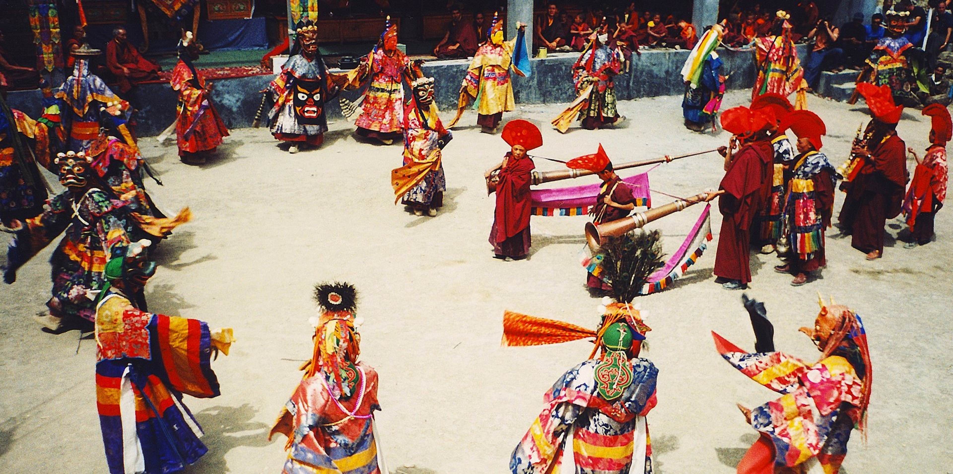 Monks performing the masked Cham dance