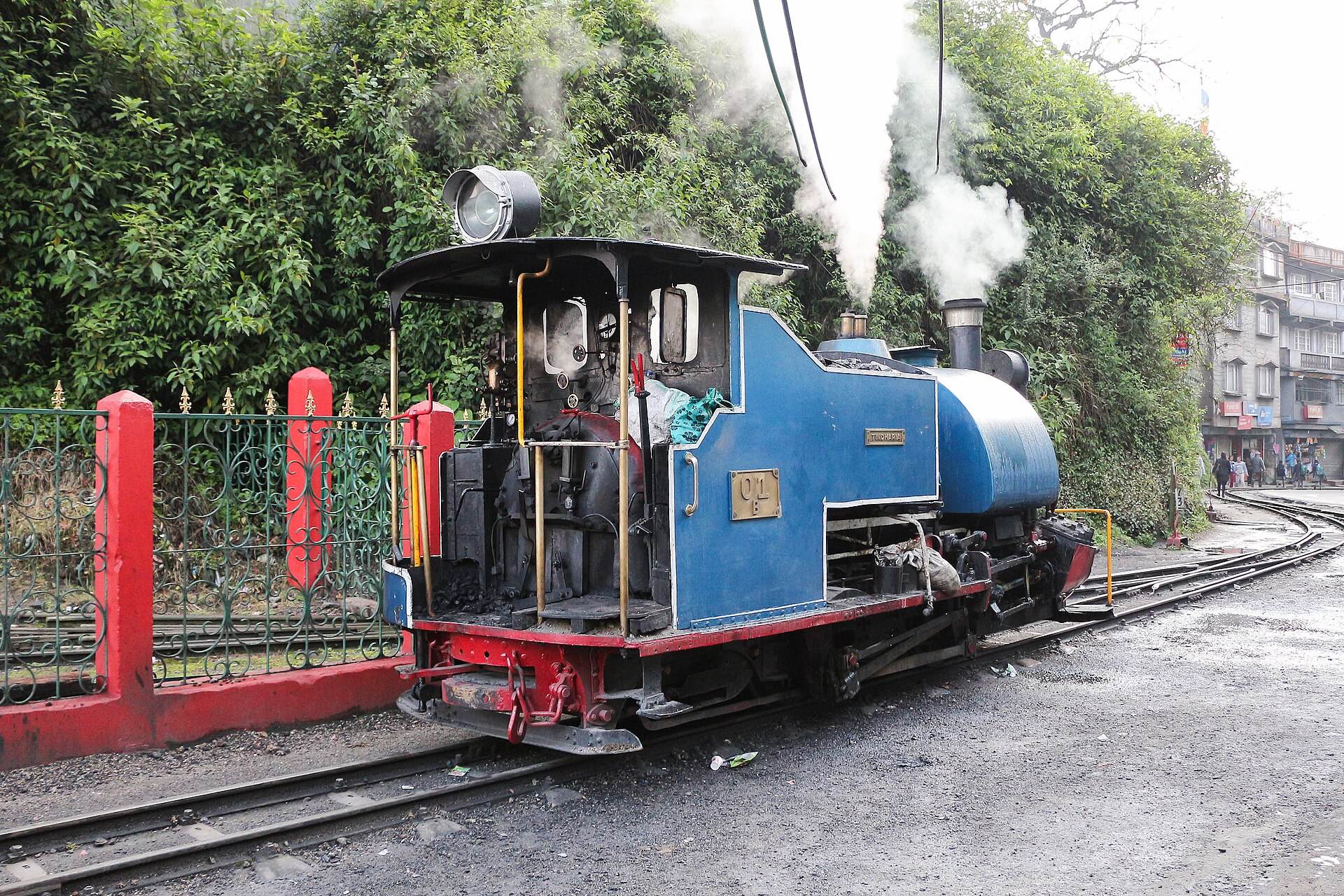 A blue steam engine of the Darjeeling toy train at Ghum station