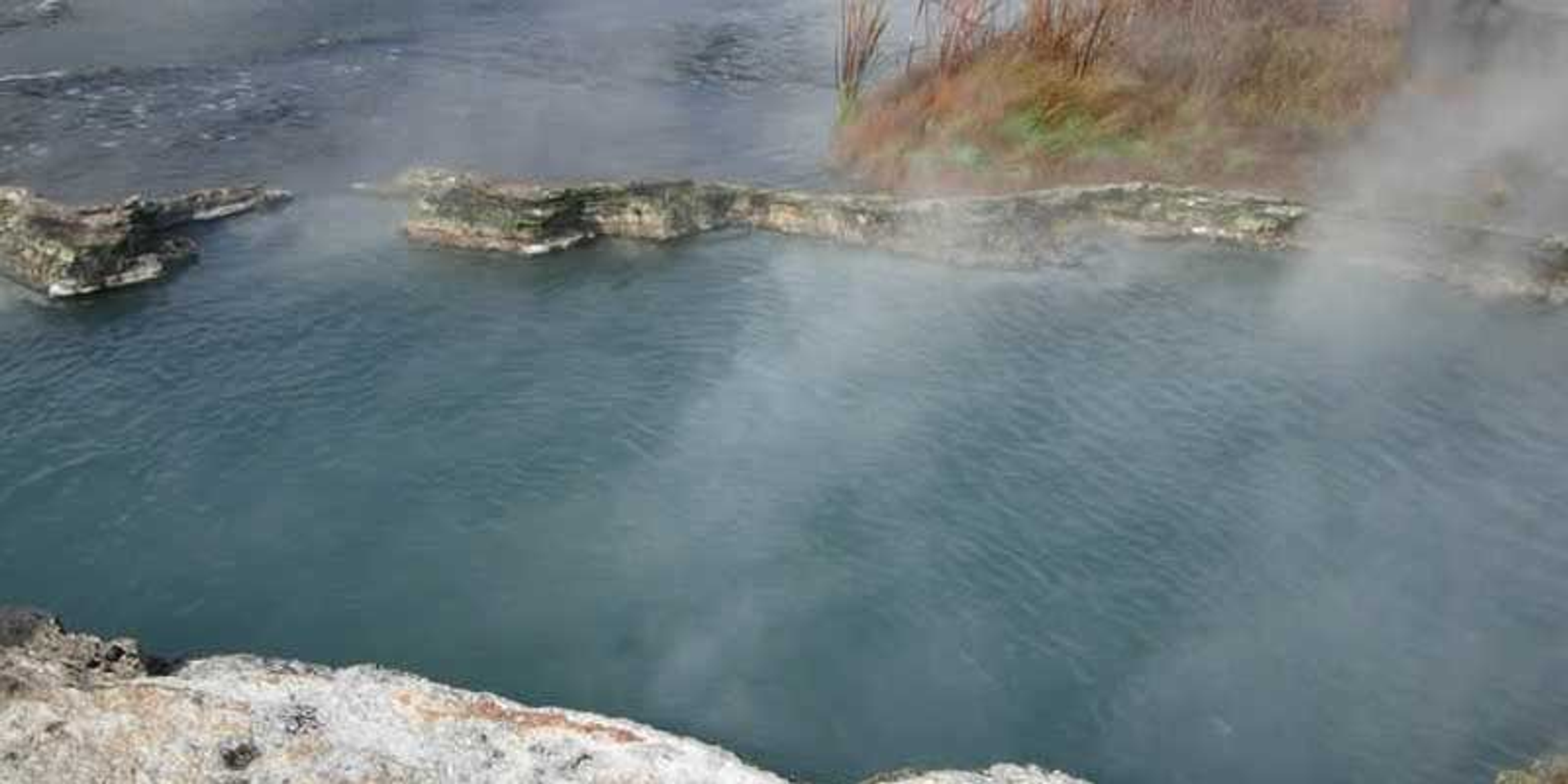 Natural hot water springs at Reshi, a traditional healing and relaxation spot by the Rangeet River in Sikkim.