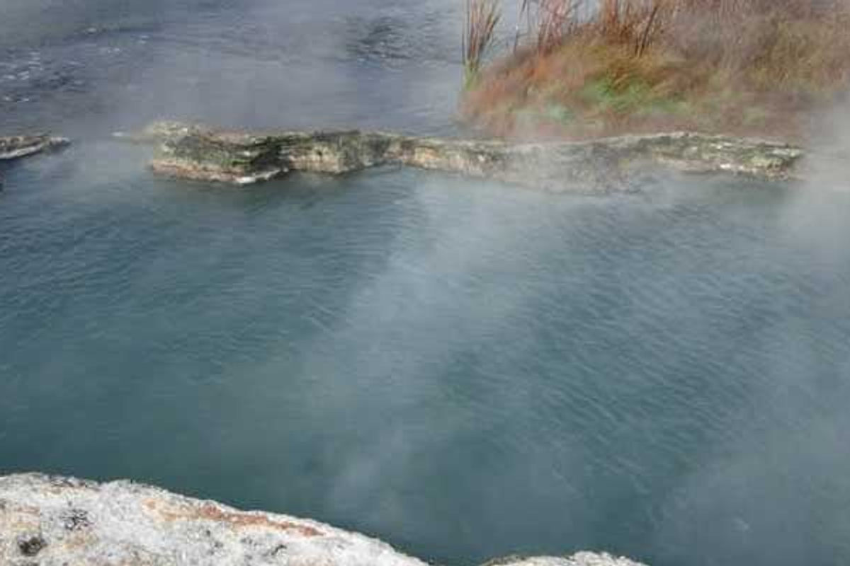 Natural hot water springs at Reshi, a traditional healing and relaxation spot by the Rangeet River in Sikkim.