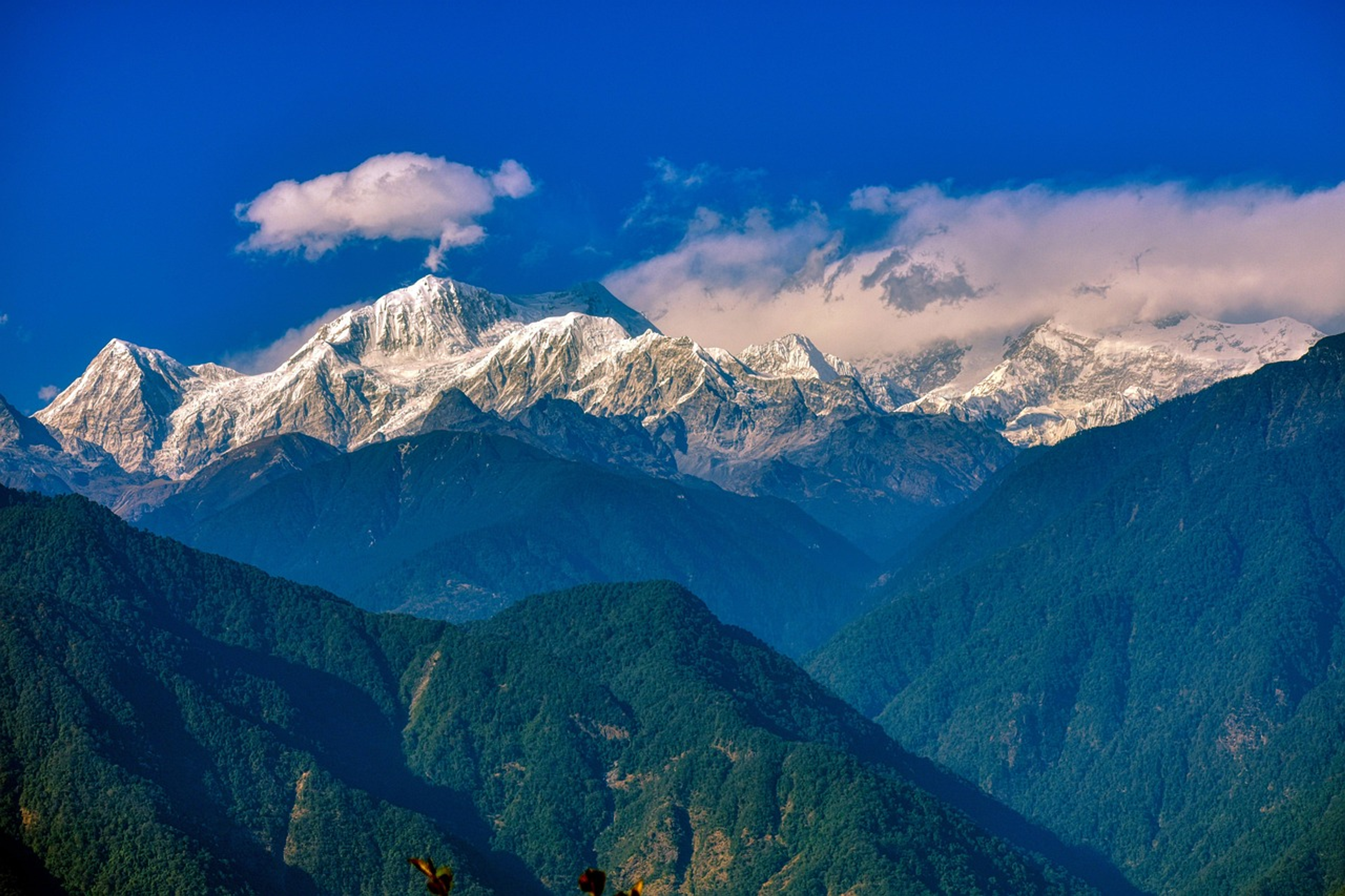 Panoramic view of the rugged , white mountain range in sikkim.