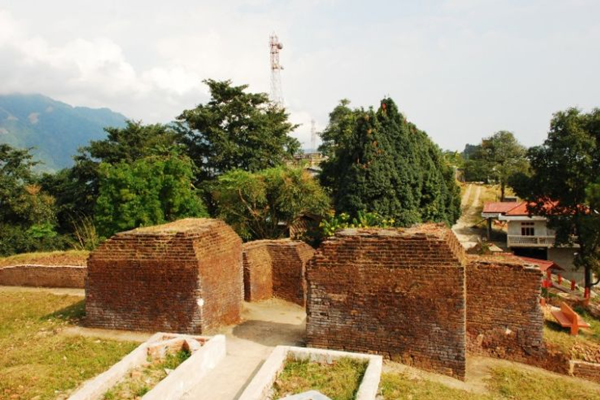 Ancient 14th-century red brick ruins of Ita Fort in Itanagar, a historical landmark of the Jitari Dynasty.