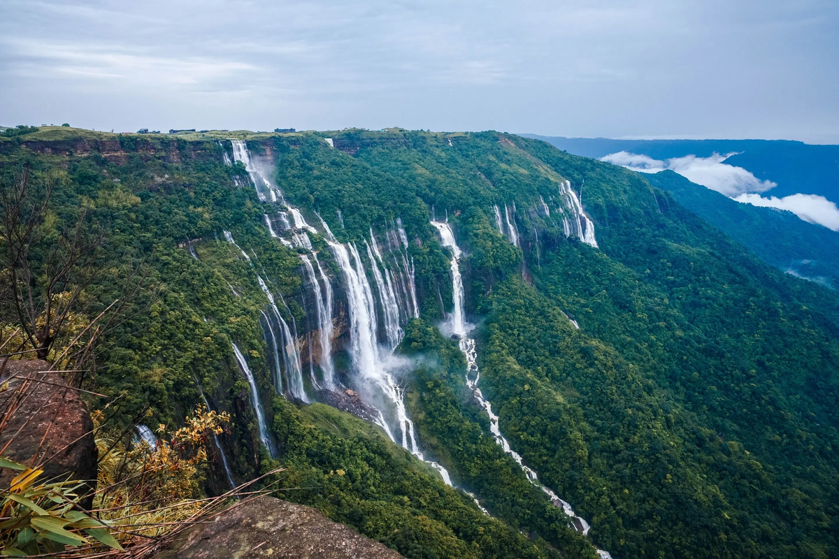 Seven Sisters Falls cascading in seven streams down green cliffs in Cherrapunji, Meghalaya
