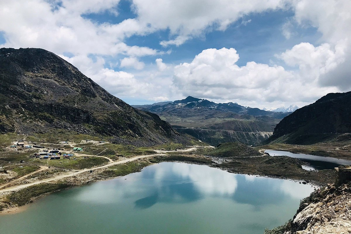 Pankang Teng Tso Lake Tawang surrounded by snow-capped mountains and clear blue skies