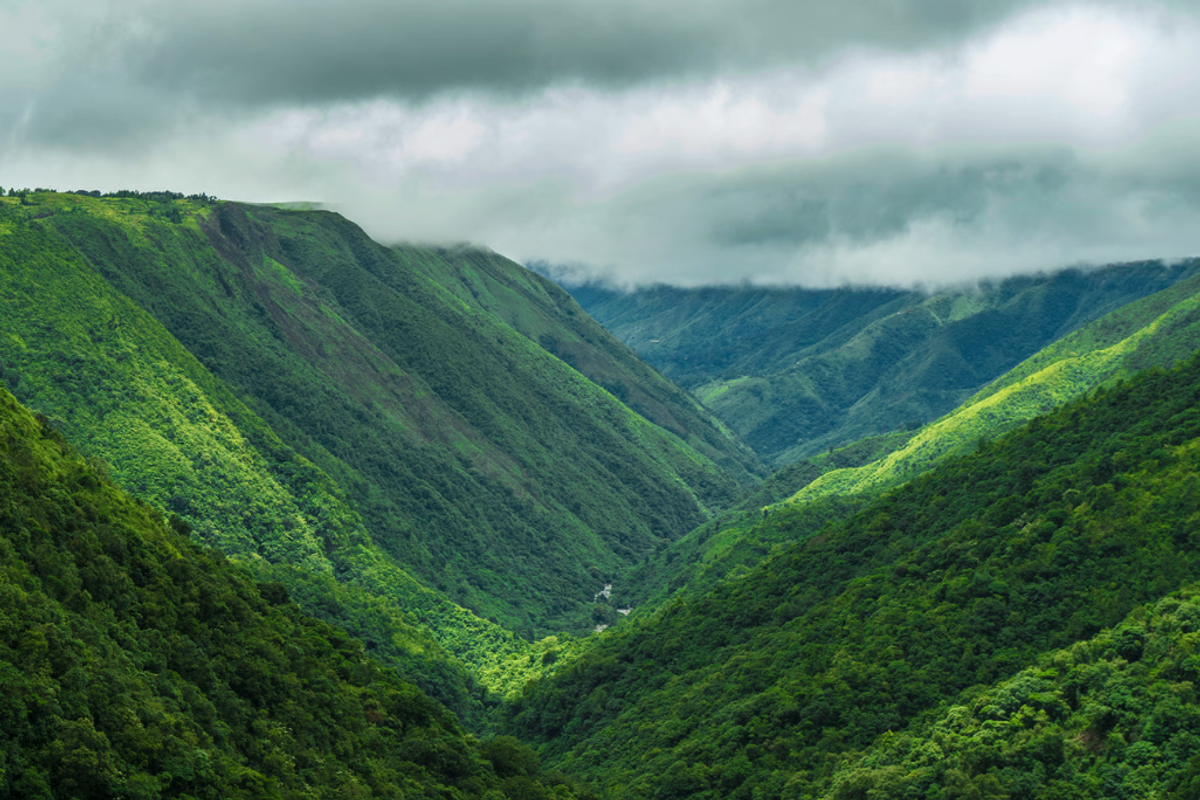 Looking deep into the vast chasm of the Mawkdok Dympep Valley from the roadside viewpoint.. Source: Meghalaya Tourism
