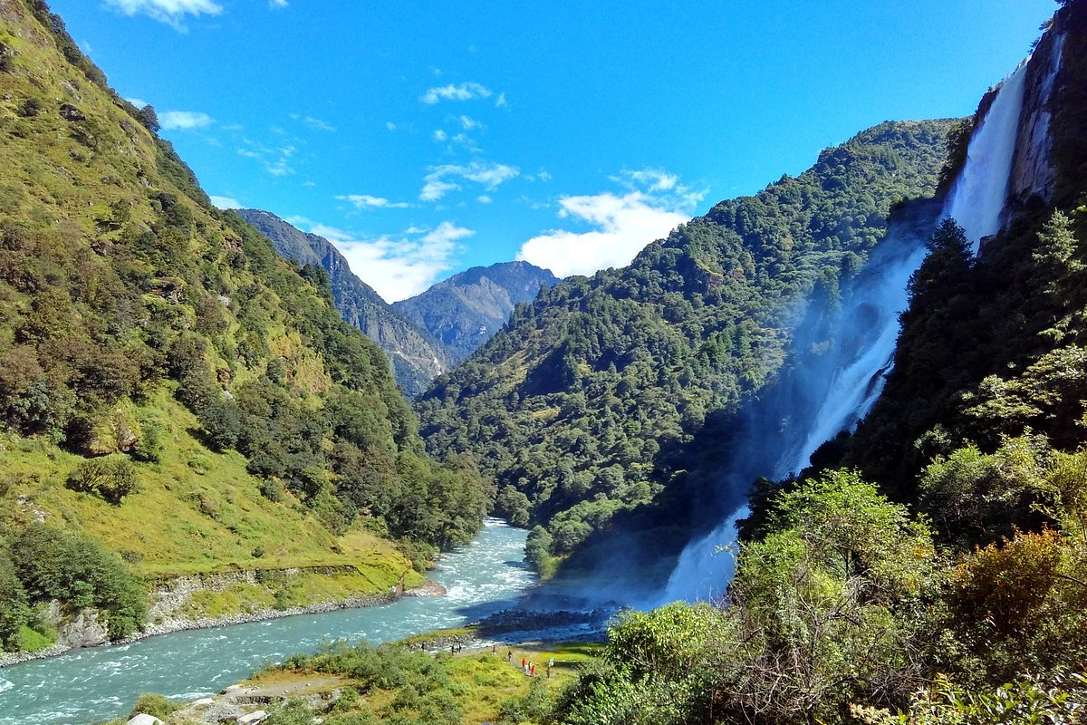 Nuranang Falls Tawang cascading 100 meters with surrounding forest and cliffs