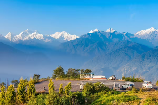 Panoramic mountain view of Pelling town West Sikkim with snow-capped Mt Kanchenjunga peaks.