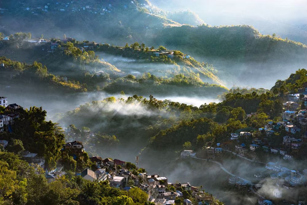 Lush green hills and landscapes of Mizoram in Northeast India showcasing the scenic beauty and peaceful mountainous environment of Mizoram.