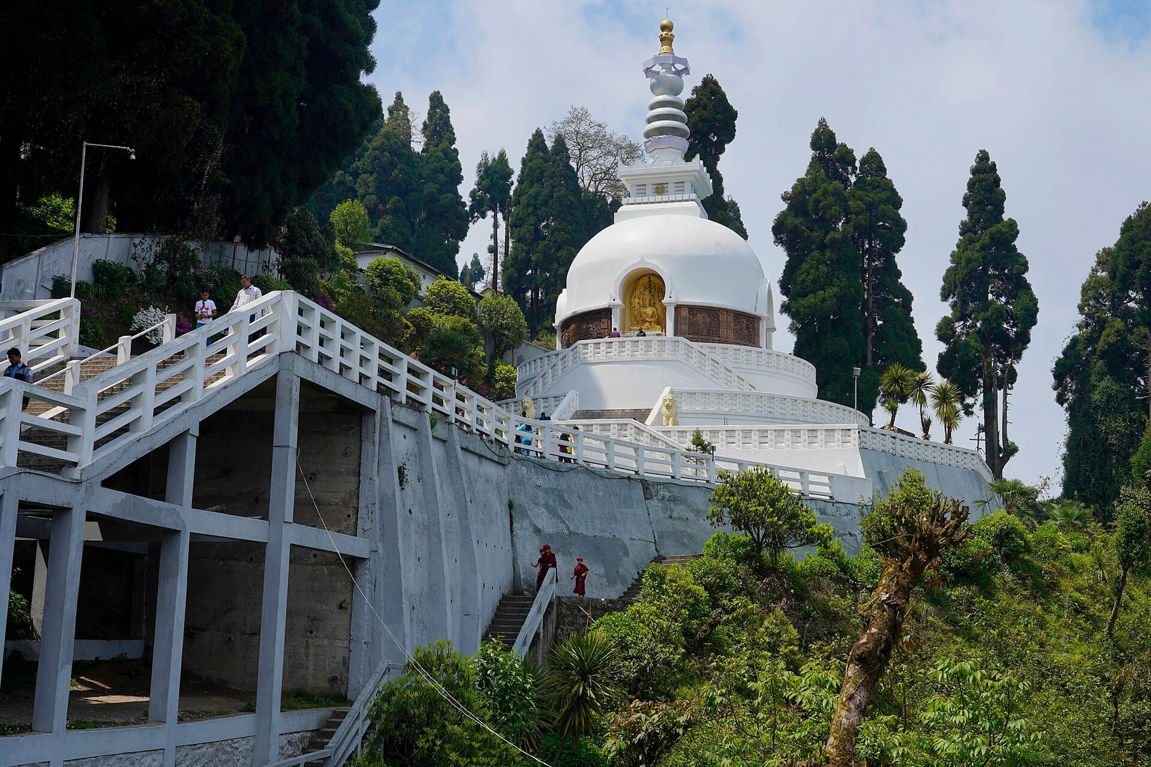 The white Japanese Peace Pagoda in the forest above Darjeeling