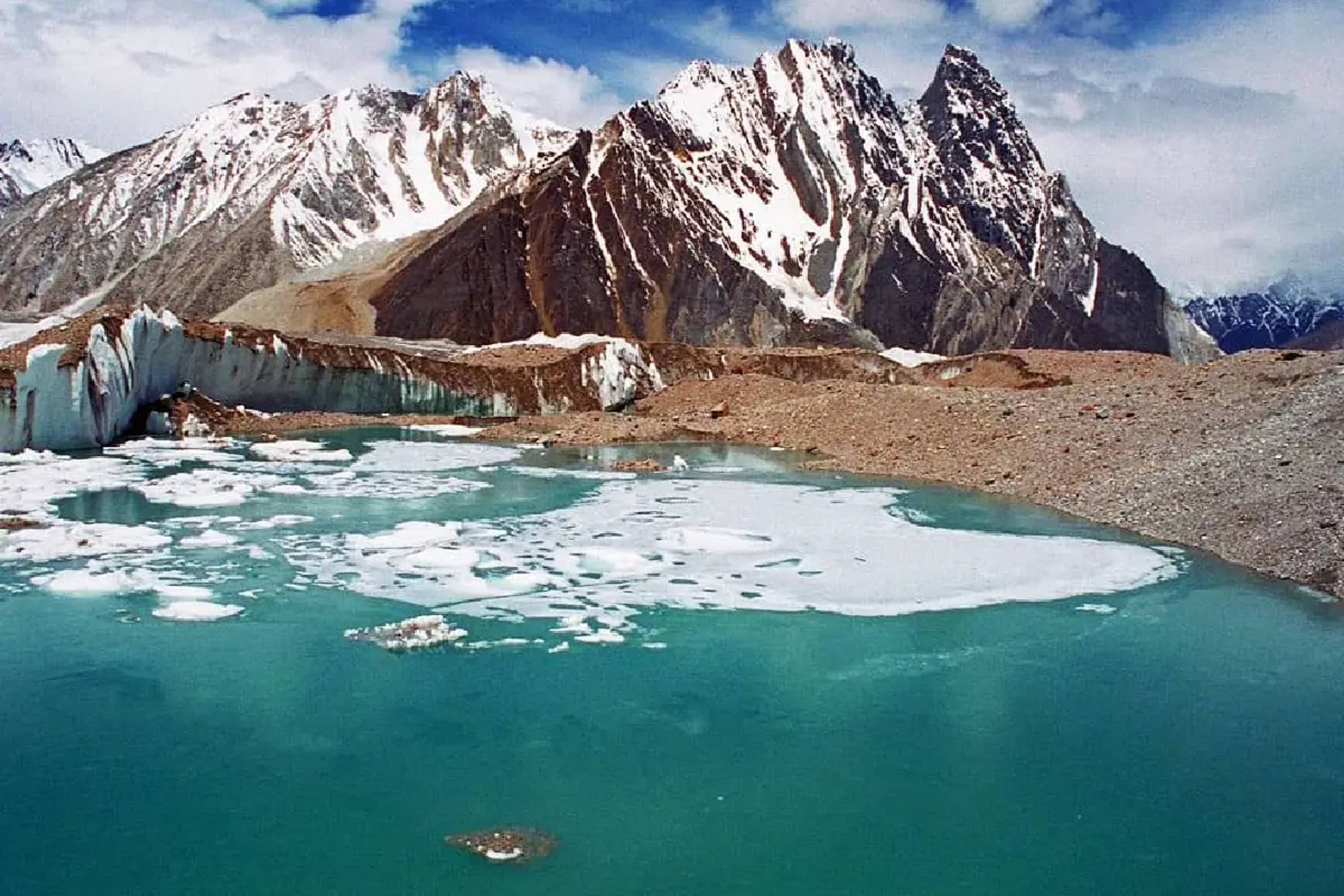 High-altitude Green Lake Trek in North Sikkim offering panoramic views of the Kanchenjunga mountain range.