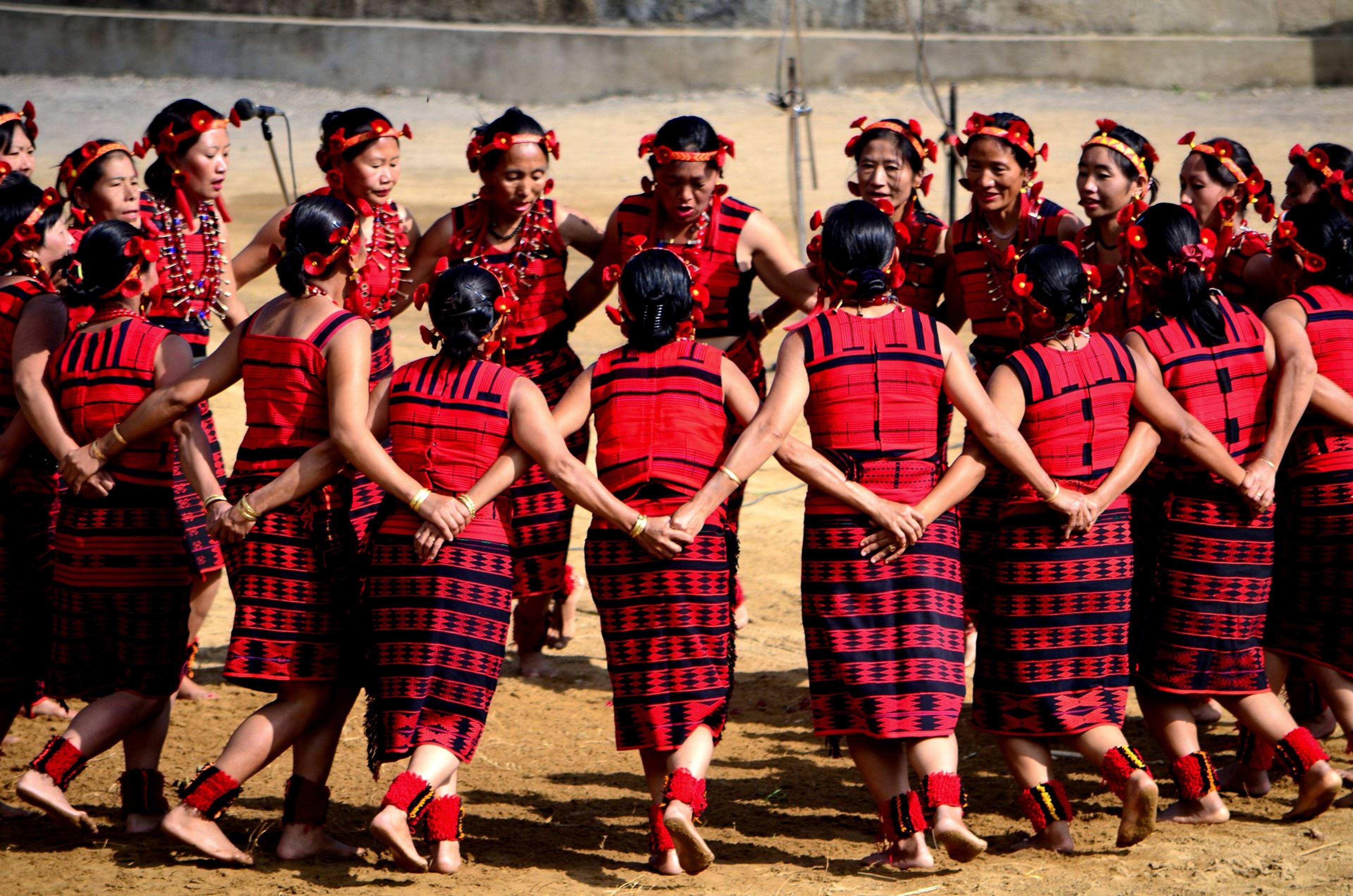 Naga performers in traditional dress at the Hornbill Festival in Kisama. Photo: Deba Prasad Roy / Wikimedia Commons (CC0)