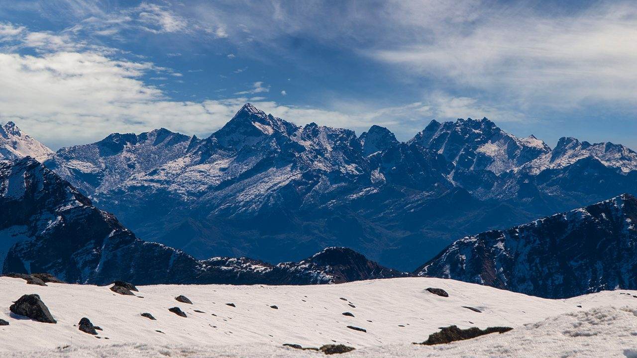 Snow on the mountains at Bumla Pass