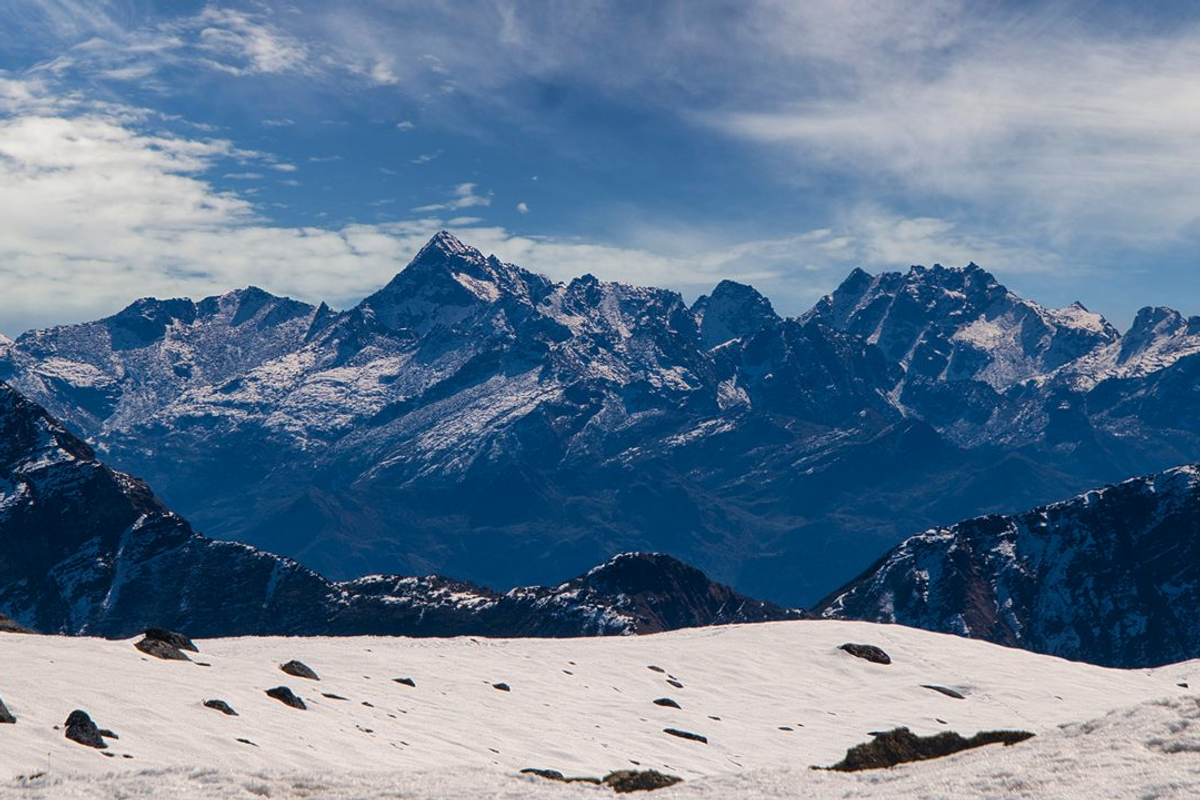 Bum La Pass India-China border gate with snow-capped Himalayan mountains