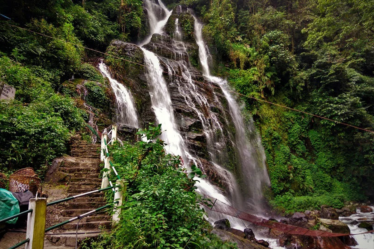 Powerful Kanchenjunga Waterfalls Pelling perennial cascade falling over rocks in West Sikkim.