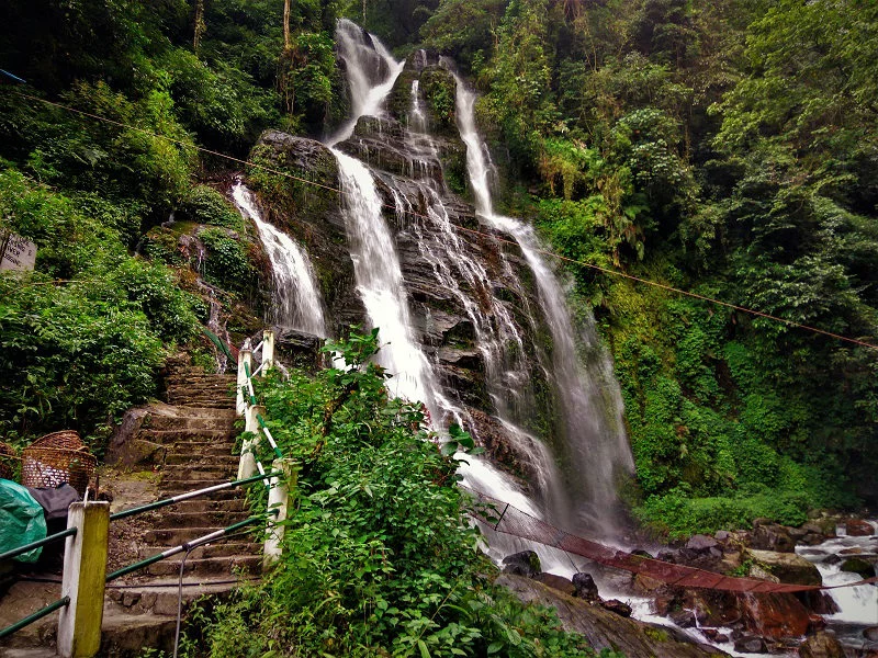 Powerful Kanchenjunga Waterfalls Pelling perennial cascade falling over rocks in West Sikkim.
