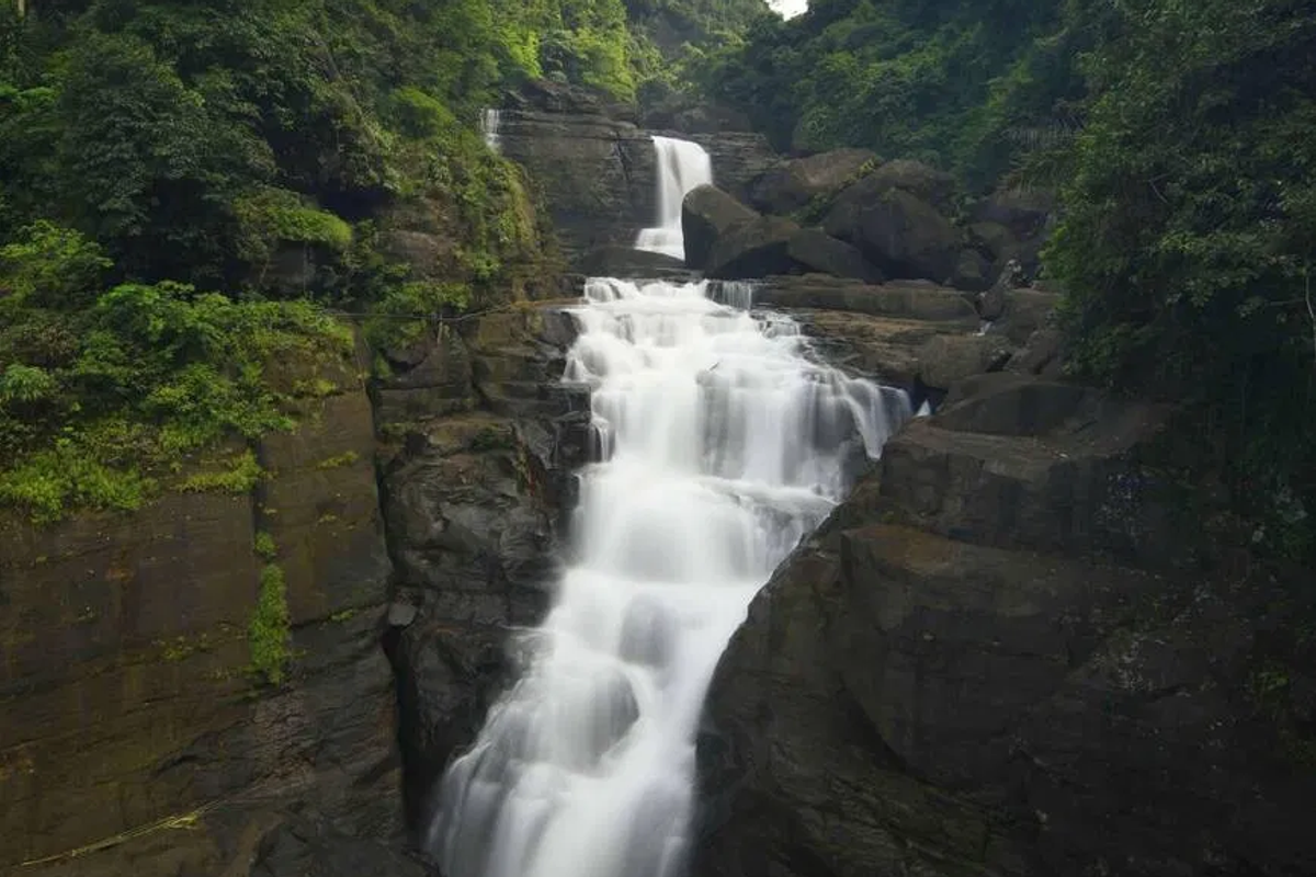 Thundering Bophill Falls near Dawki Meghalaya overlooking the India-Bangladesh border.