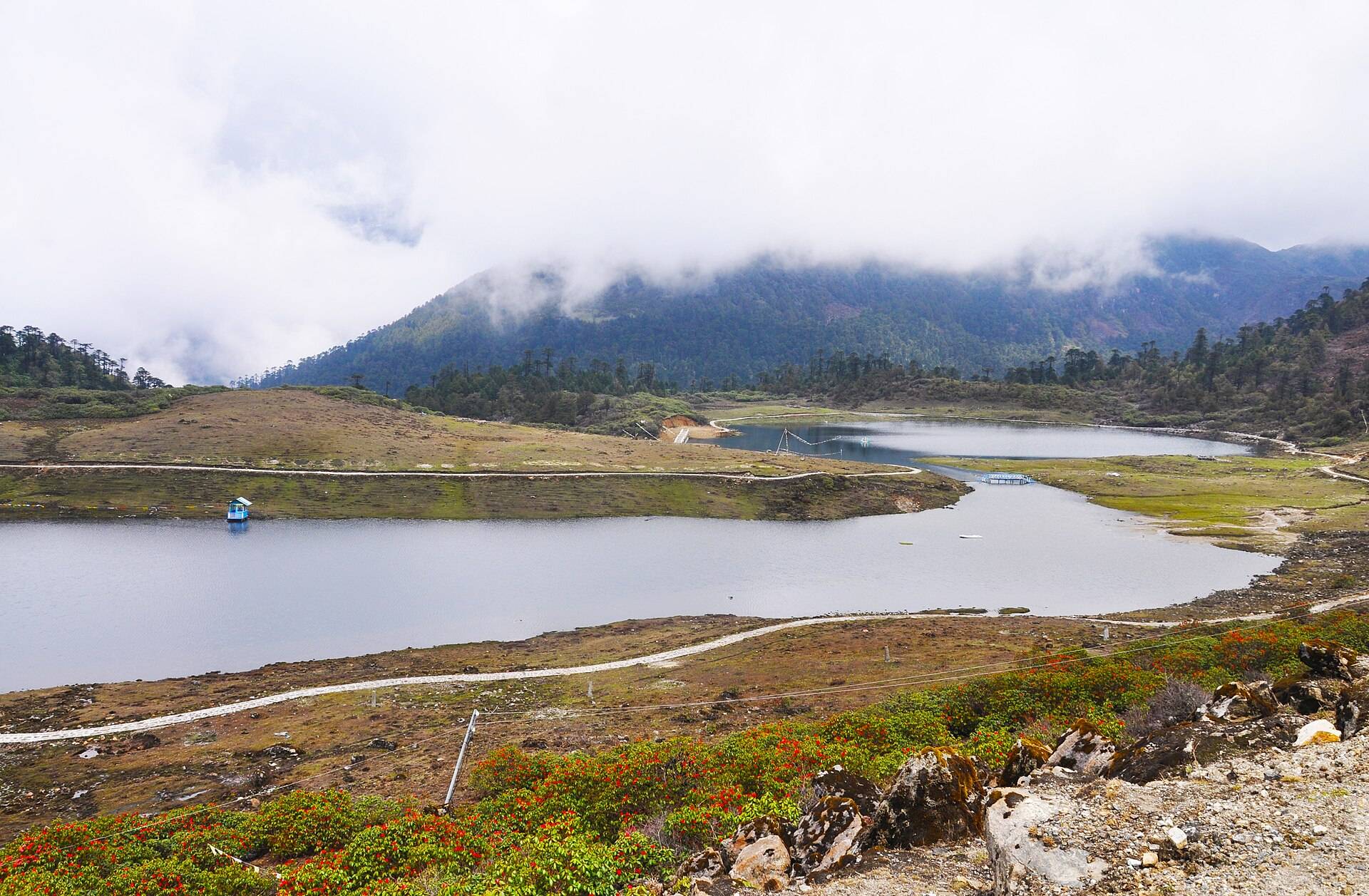PT Tso lake surrounded by rocky hills on the road above Tawang