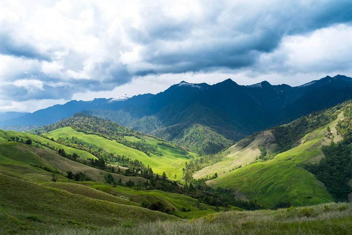 Snowy peaks surrounding the scenic Mechuka Valley, often called the Switzerland of India, in Arunachal Pradesh.