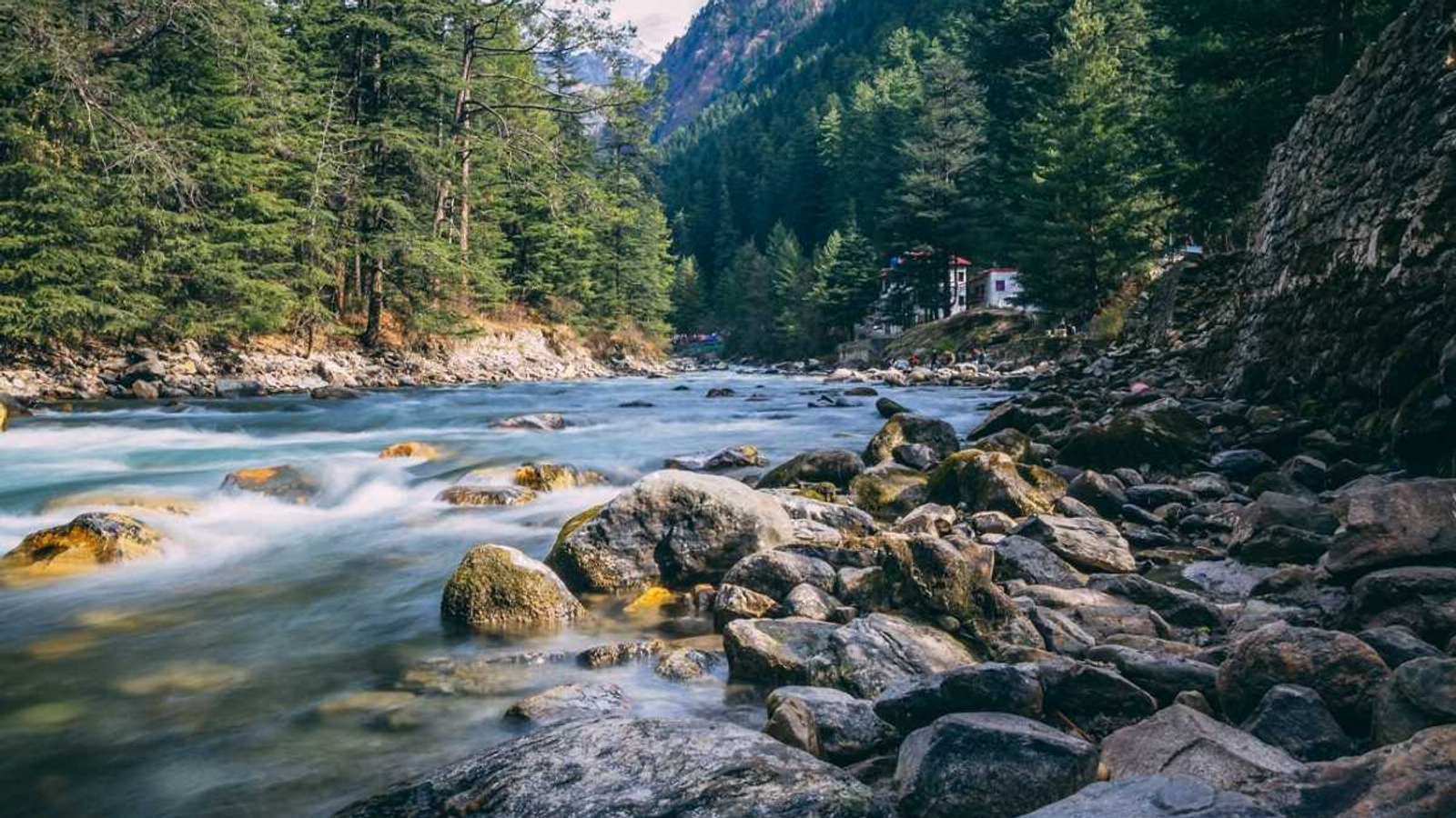 The turquoise Siang River flowing through the mountains of Pasighat, Arunachal Pradesh.
