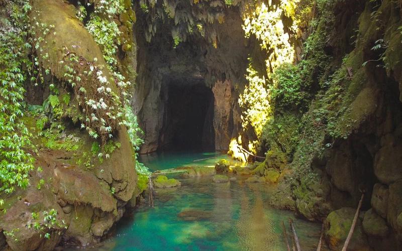 Entrance of Krem Chympe cave in Meghalaya with rocky formations