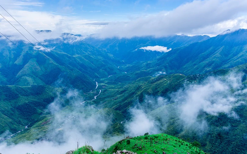Laitlum Canyon Shillong Meghalaya — dramatic misty gorges and layered green valleys in the East Khasi Hills at sunrise