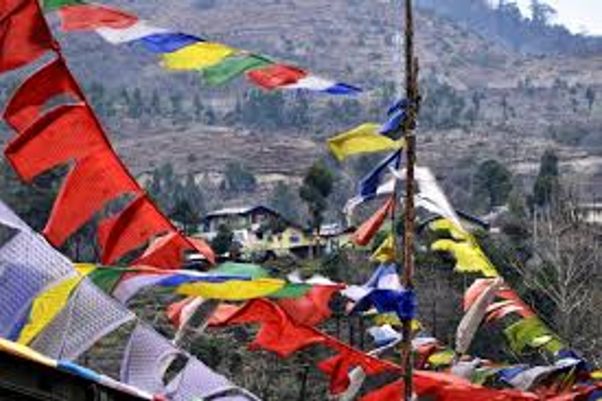 Colorful Buddhist prayer flags fluttering in the wind at Bumla Pass near the Indo-China border in Arunachal Pradesh.