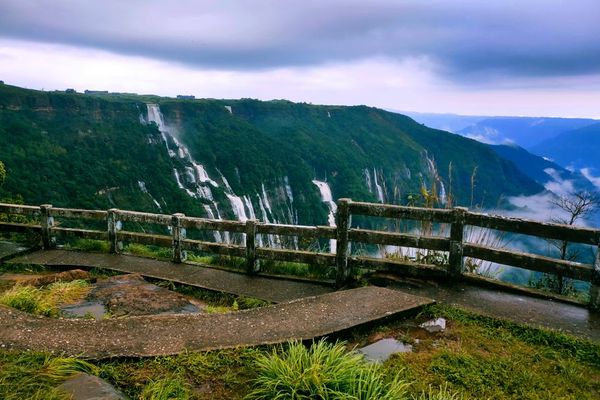 Panoramic view of cherrapunji waterfalls and lush green hills in meghalaya