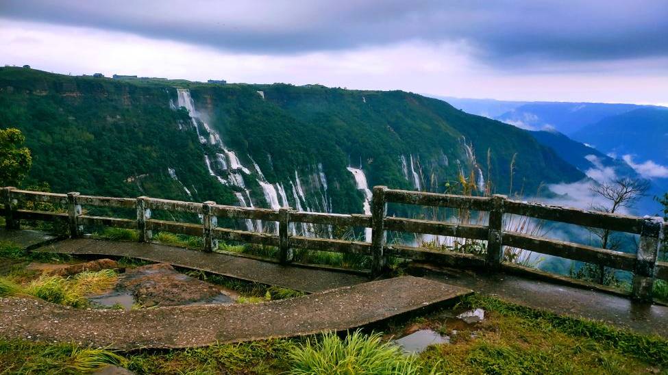 Panoramic view of cherrapunji waterfalls and lush green hills in meghalaya