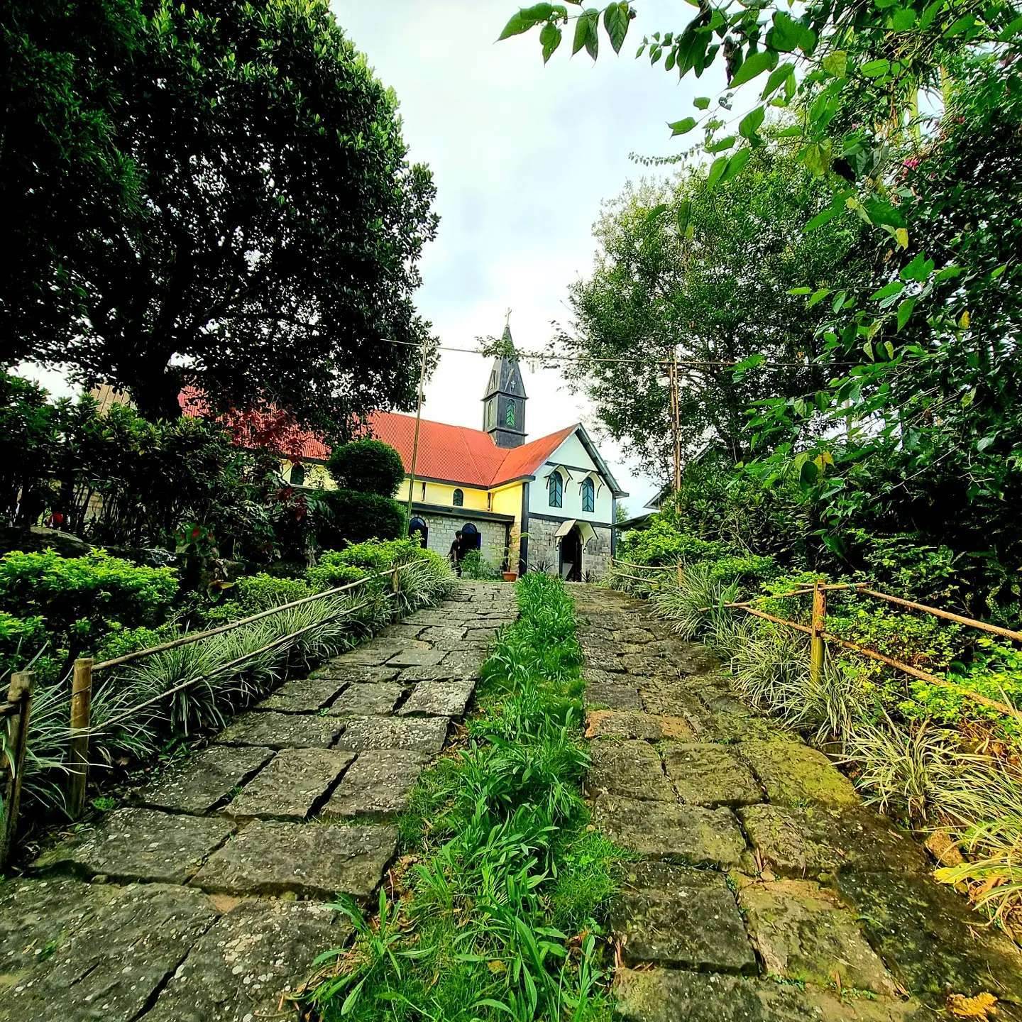 A stone path to the church in Mawlynnong