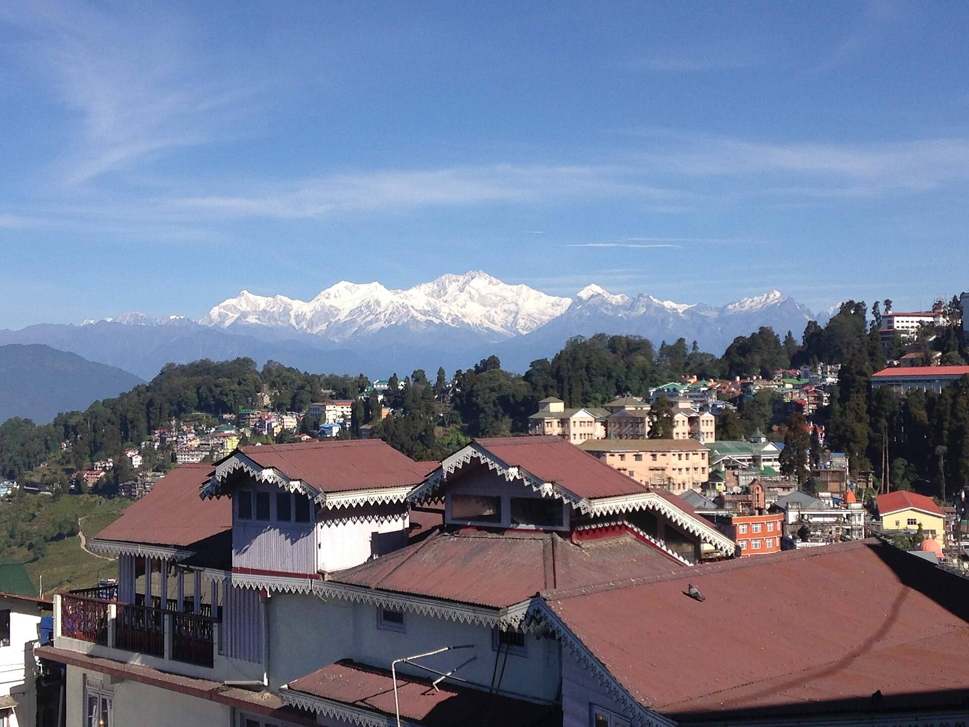 Kanchenjunga rising above the rooftops of Darjeeling
