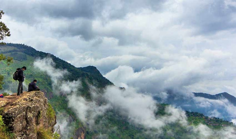 Trekking in Meghalaya with lush green hills and misty landscapes