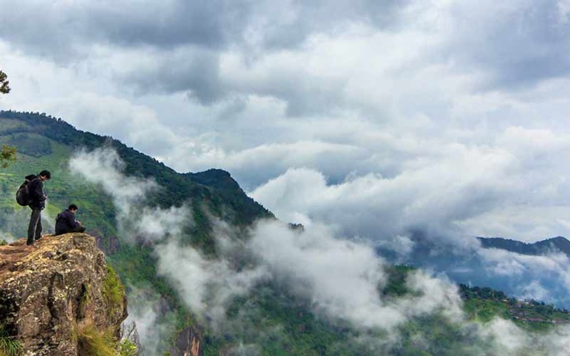 Trekking in Meghalaya with lush green hills and misty landscapes