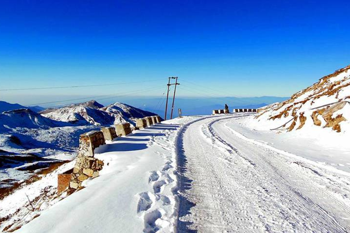 High-altitude Nathang Valley on the Old Silk Route completely covered in deep pristine white snow during the best time for snowfall in Sikkim.