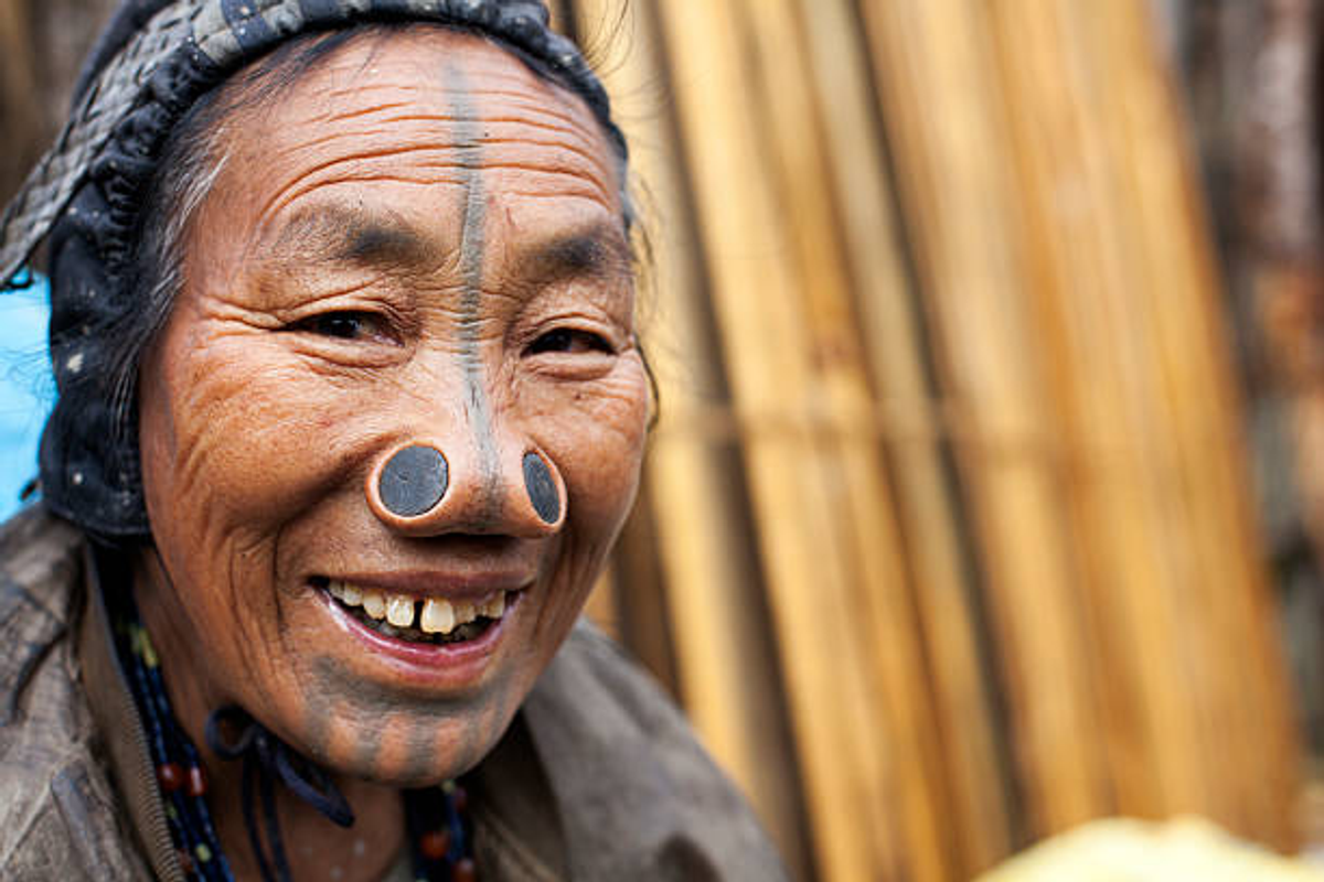 An elder woman of the Apatani tribe in Ziro Valley, Arunachal Pradesh, showcasing unique tribal heritage and traditional nose plugs.