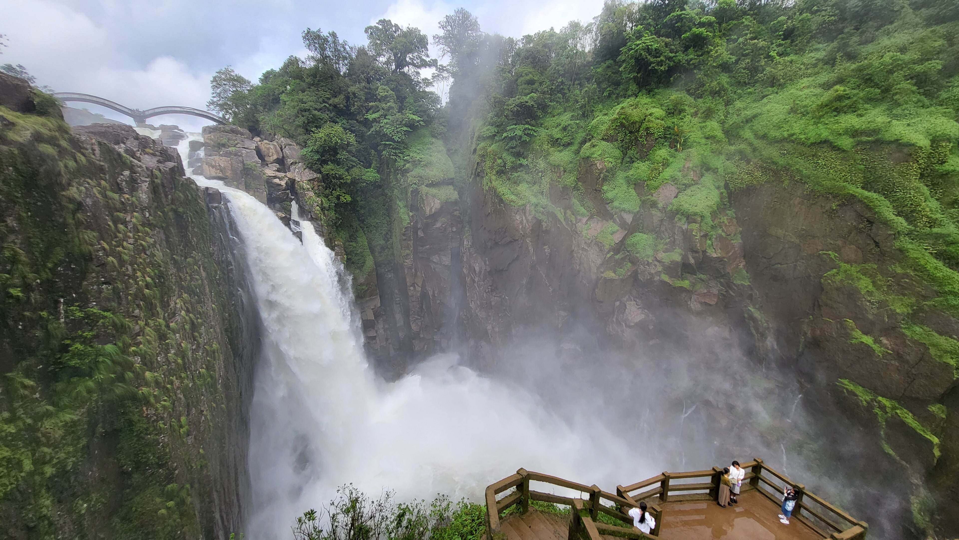 Weinia Falls near Nongkhnum Island, with its bridge and viewing platform