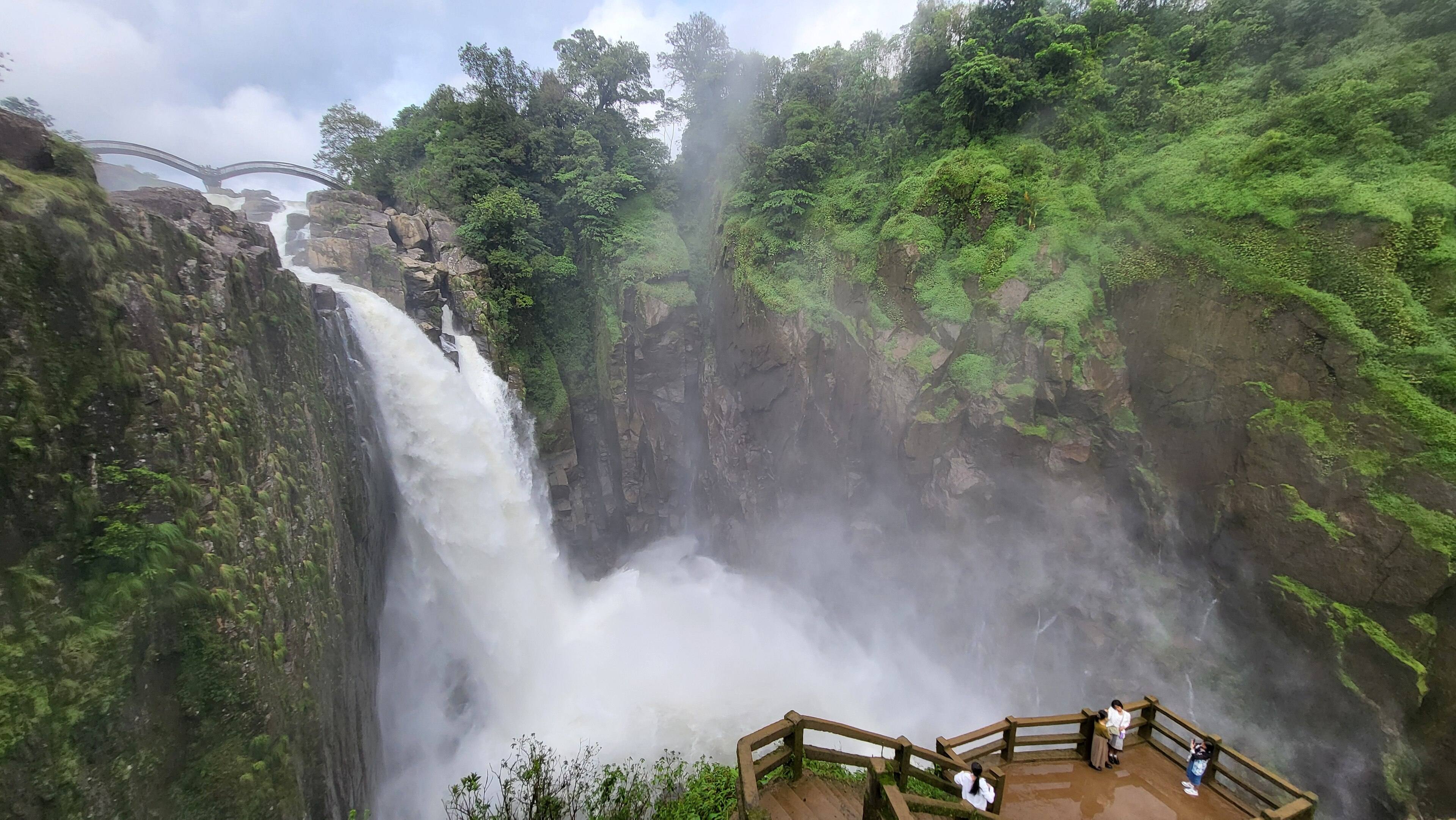 Weinia Falls near Nongkhnum Island, with its bridge and viewing platform