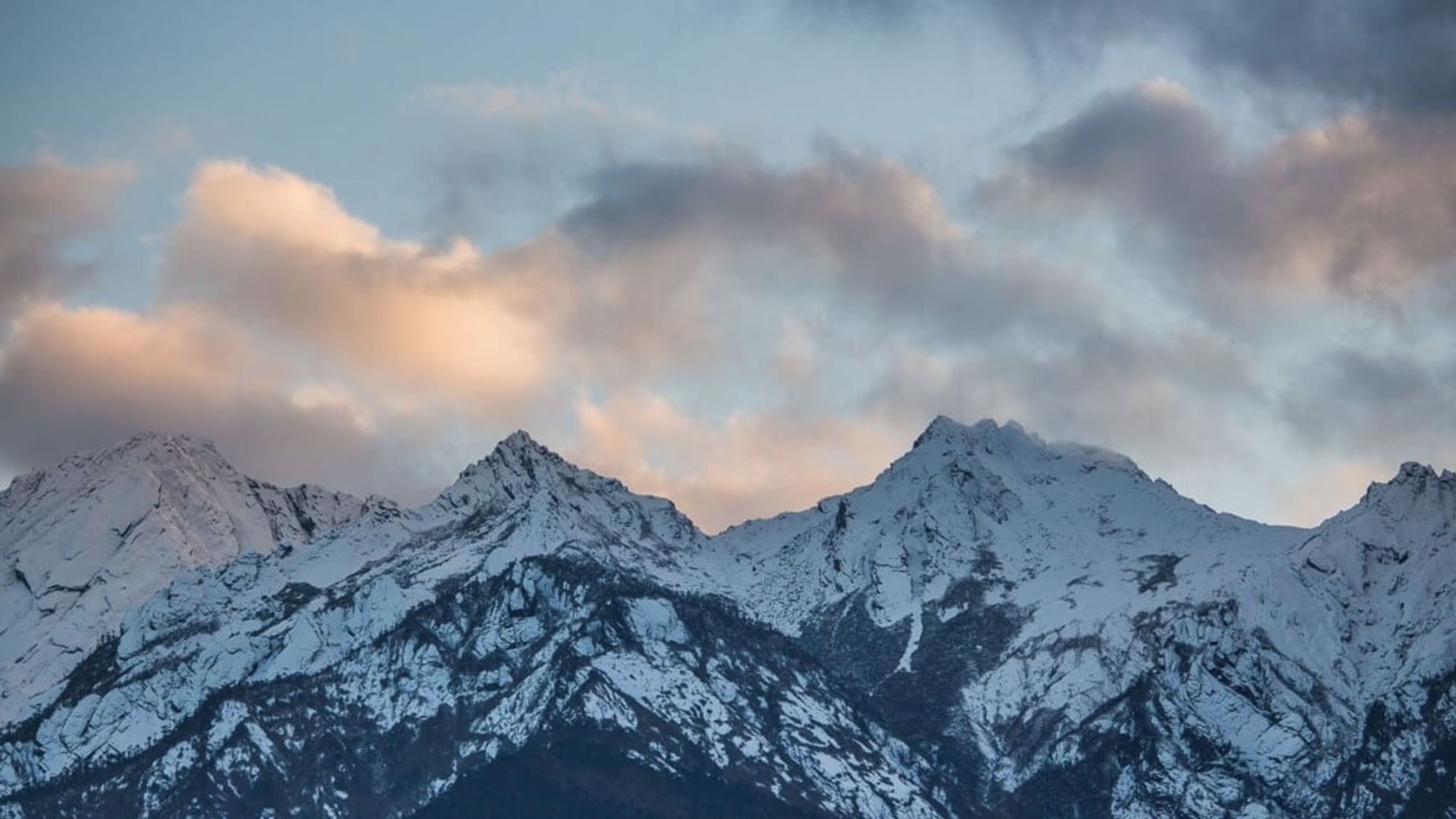 Snow-covered Mechuka Valley in Arunachal Pradesh with white Himalayan mountains, frozen landscapes, and scenic winter views