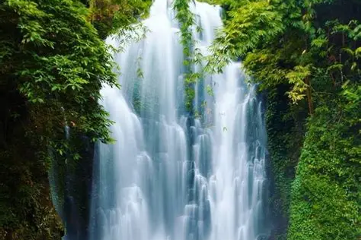 Kakochang Waterfall cascading through dense forest near Bokakhat, Kaziranga Assam