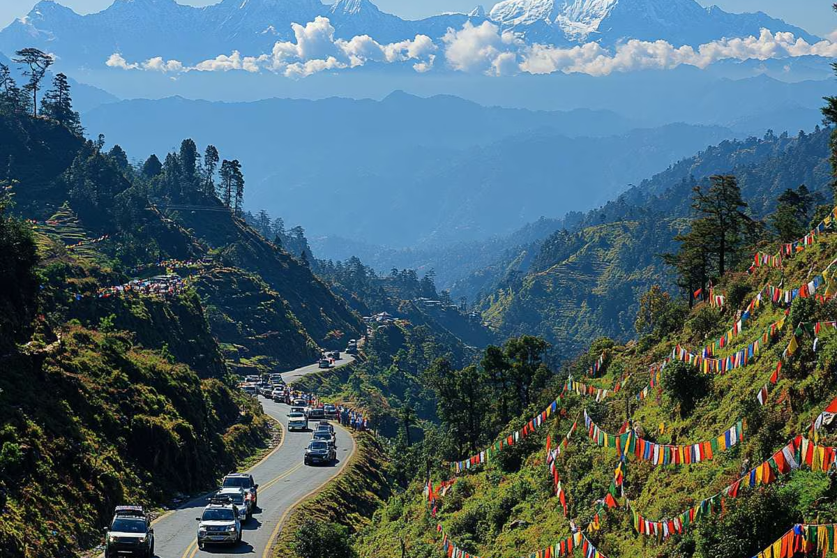 A luxury SUV driving on the scenic NH10 highway alongside the emerald-green Teesta River on the way to Gangtok, Sikkim.