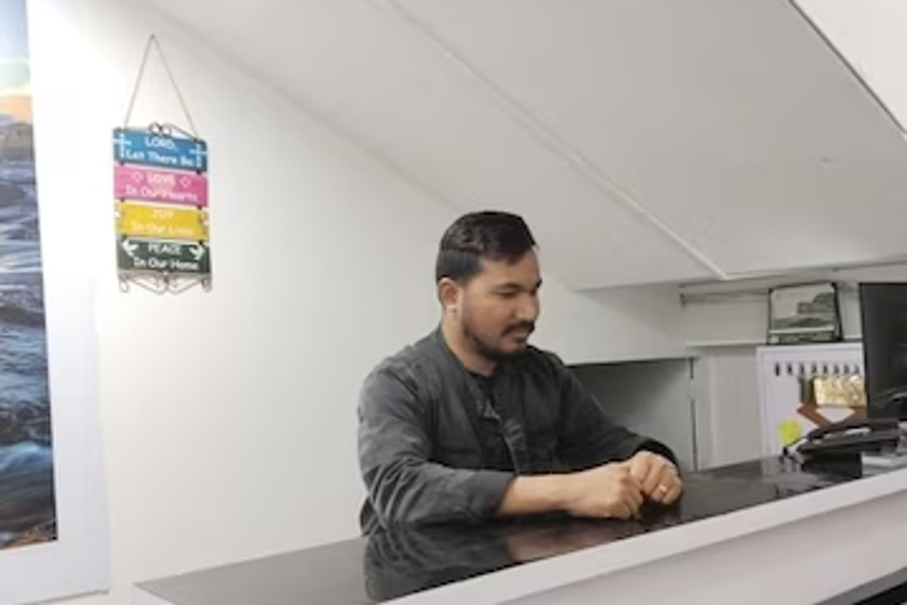 Guest checking in at a homestay reception in Meghalaya