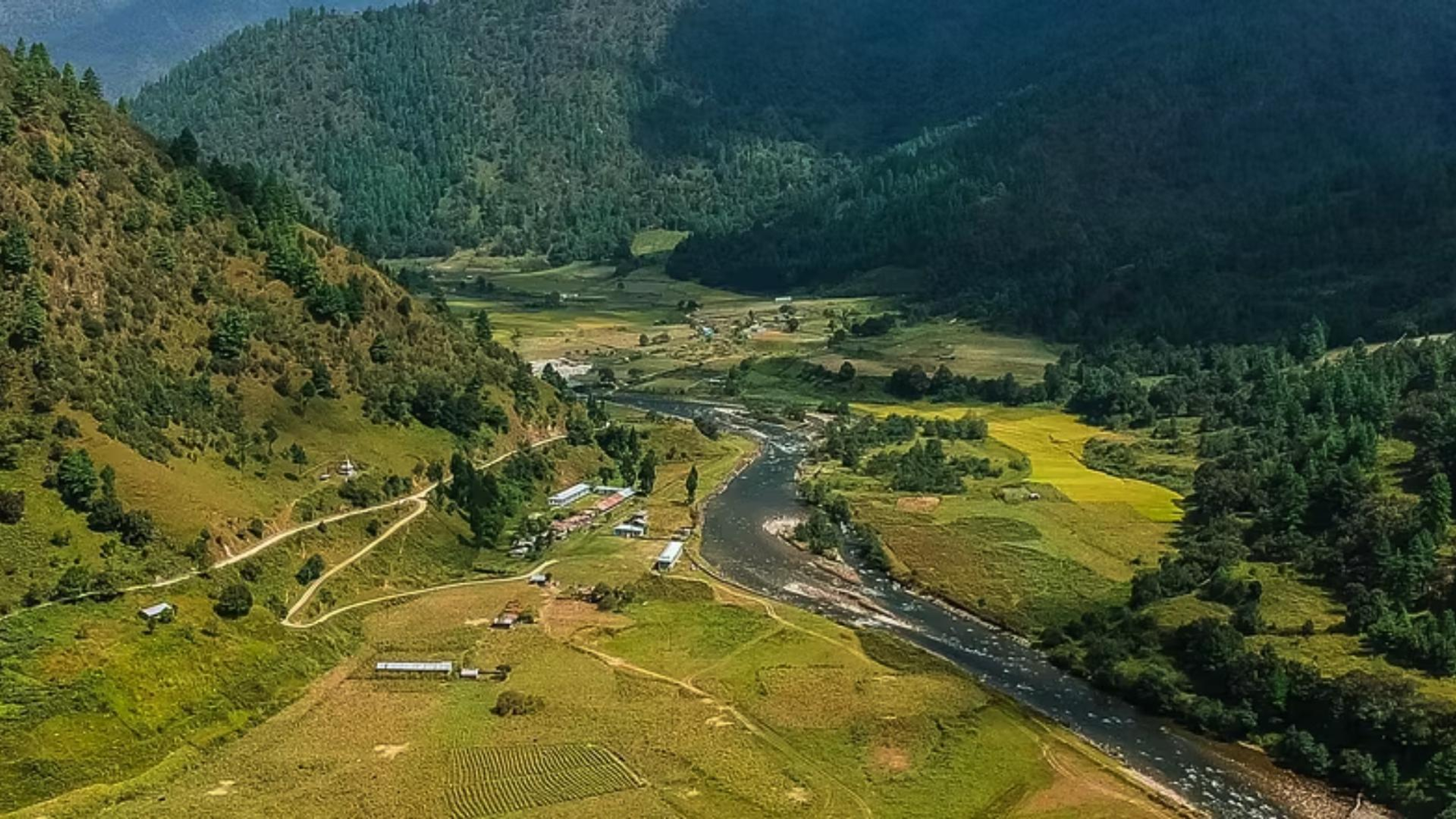 Lush green mountain valley and river in Arunachal Pradesh