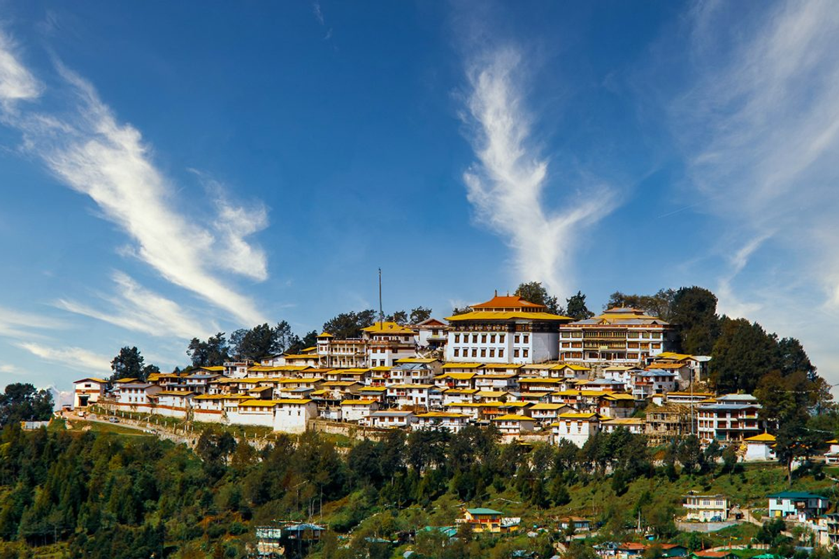 Tawang Monastery perched on a hill with panoramic Himalayan valley view