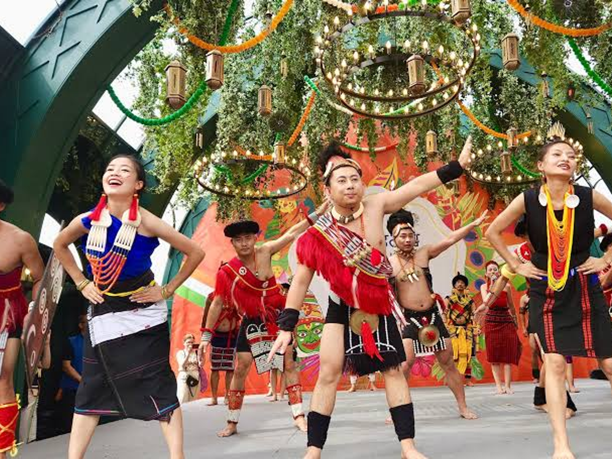 Naga performers in traditional dress on stage
