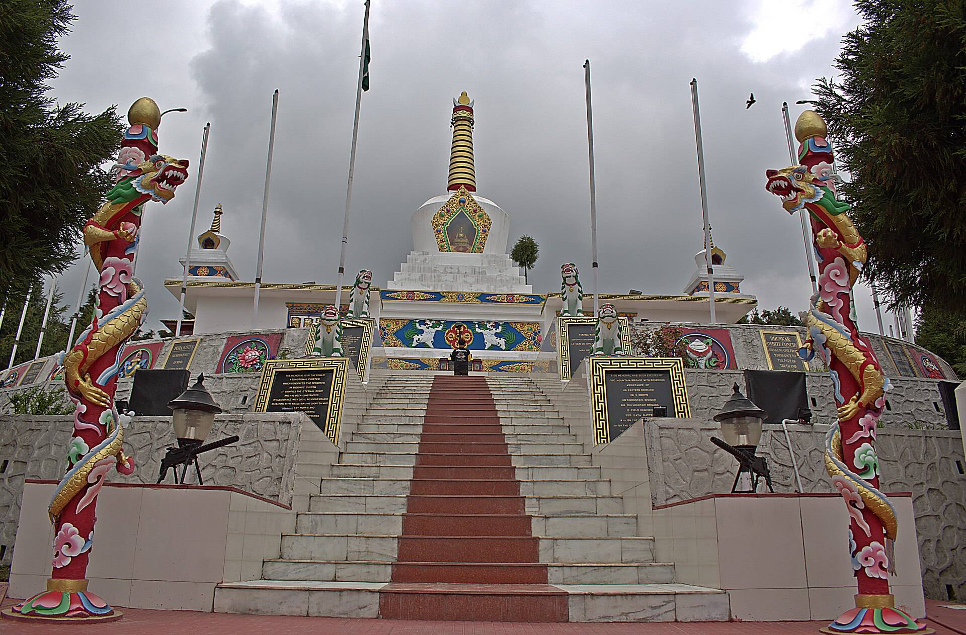 Stupa-shaped Tawang War Memorial with dragon pillars