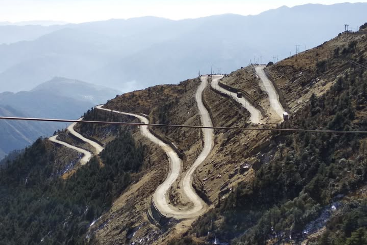 Cinematic view of the winding mountain roads on the way from Guwahati to Tawang, Arunachal Pradesh.