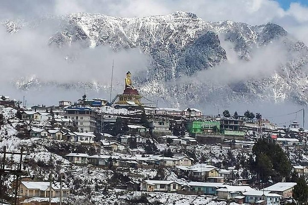 Tawang town  view with Buddha statue.