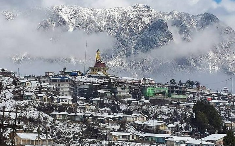 Tawang town  view with Buddha statue.