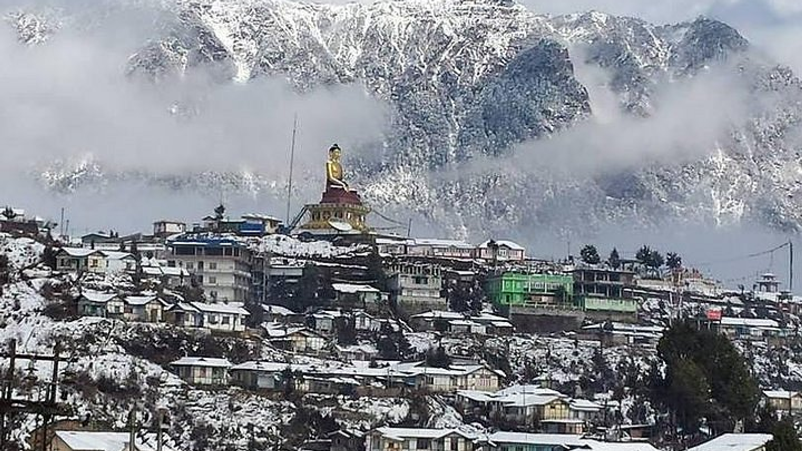 Tawang town  view with Buddha statue.