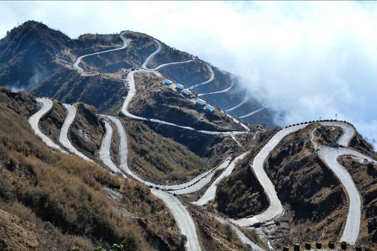 The scenic winding road from Gangtok to Tsomgo Lake and Nathu La Pass, East Sikkim.