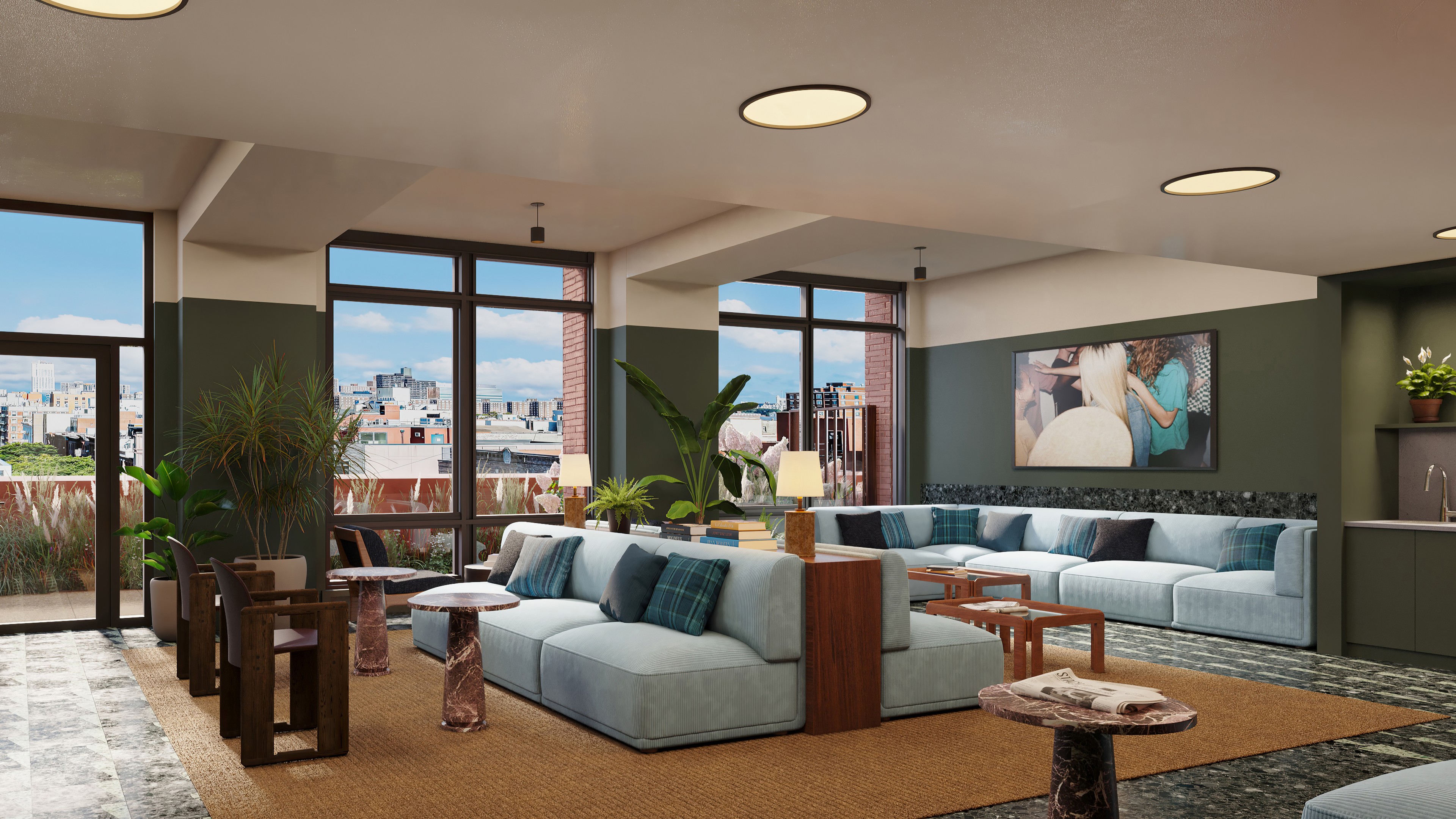 Ray Harlem's living room with comfortable lounge seating, a small kitchenette, and access to a landscaped terrace.